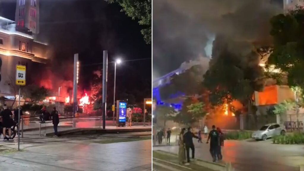 apos-incendio,-funcionarios-trabalham-em-area-externa-atingida-no-edificio-touring